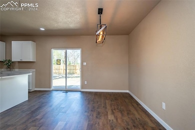 Dining area w/ new walk-out to yard