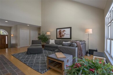 Living room with abundant natural...