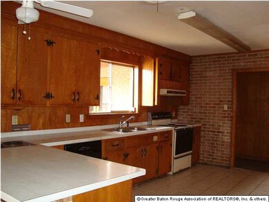 The Kitchen has a breakfast bar, newer dishwasher,