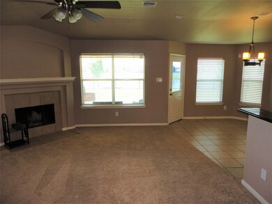 Another view of the family room showing the views to the water, open to breakfast and kitchen areas