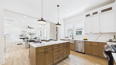Quartz countertops and backsplash to add fluidity