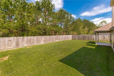 Tree lined, fenced rear yard