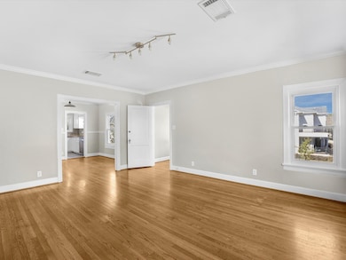 From the back corner of the living room looking to