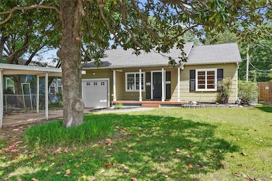 Ranch-style house featuring an attached garage and