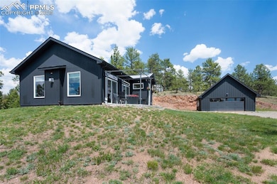 The detached 2 car garage is just a few steps from the home, and has a concrete floor and electric charging station for your EV car.