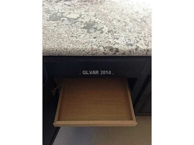 Kitchen. Roll out trays at kitchen offer easy acce