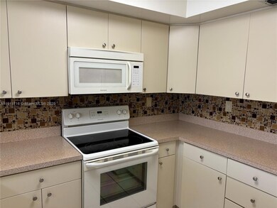 8933 SW 123 Ct unit 105, Unincorporated Dade County, FL 33186 - photo 2