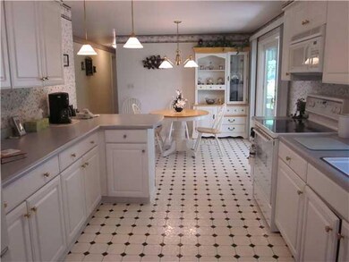 Kitchen. Kitchen and dining area. Patio doors exit
