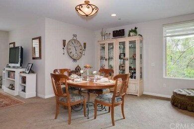 Dining Area with Custom Light Fixture