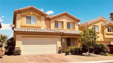 View of front of home featuring an attached garage