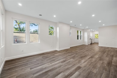 Sunny modern floor plan with lots of windows, rece