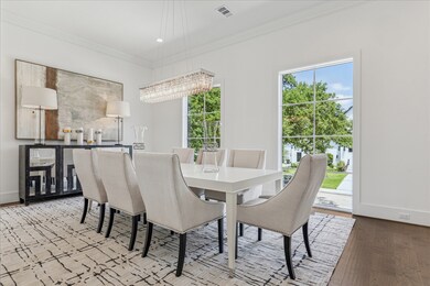 This formal dining room is filled with natural lig