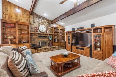 Look at that tall ceilings, wood beams, stone fire