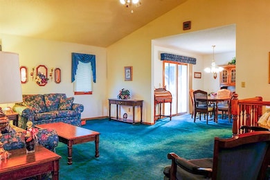Vaulted ceilings in spacious living room.