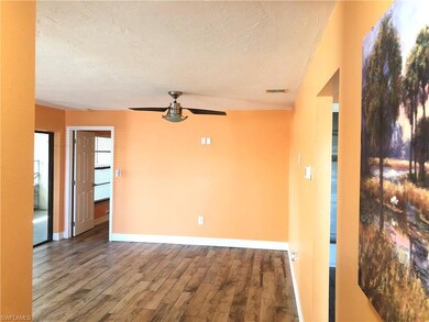 Newly painted interior walls and baseboards.