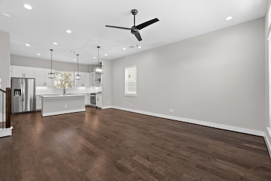 The living space offers ample room for seating, ensuring your guests have plenty of comfortable space to relax and unwind