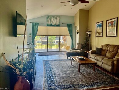 Living area with wood finished floors, a ceiling f
