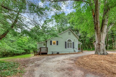 Nestled inside wooded lot(circular driveway)