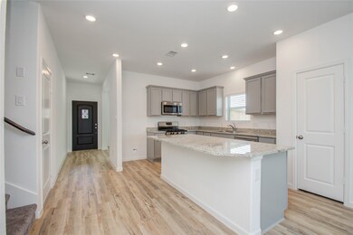 The kitchen features a large island.