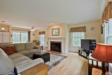 Living room with wood burning fireplace
