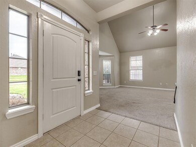 Carpeted foyer with high vaulted ceiling, ceiling 