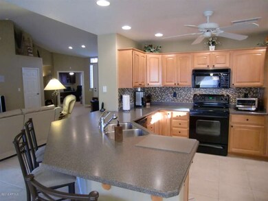 Kitchen features CORIAN countertops