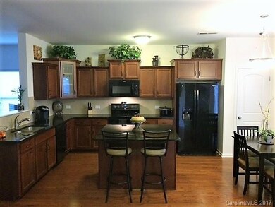 Eat in kitchen with nice size pantry.