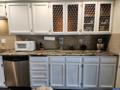 SS Appliances, solid countertops, bakers island and more.