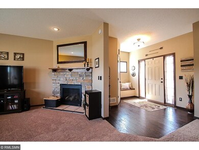 SPACIOUS FOYER AND STONE FRONTED GAS FIREPLACE!