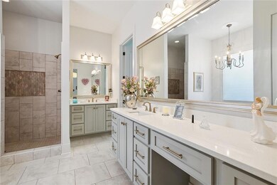 Double sinks, vanity, separate shower, & a water c