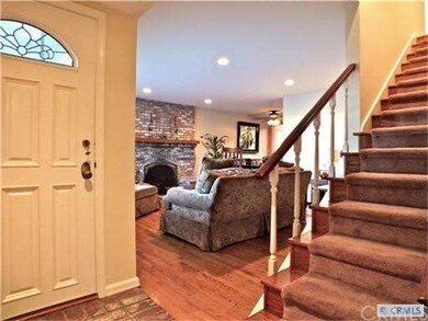 Enter from front door or garage.