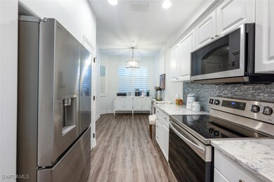 Kitchen with visible vents, stainless steel applia