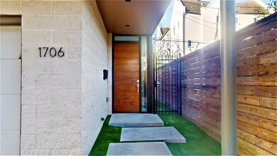 Front door with beautiful hardwood finish and entr
