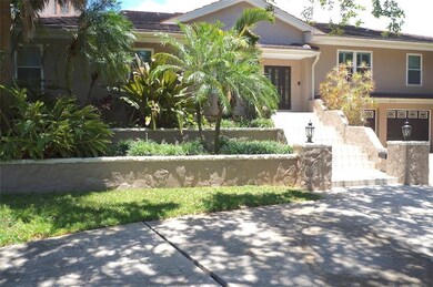 Front view with circular driveway