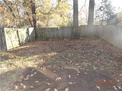 Nice backyard with wood fence