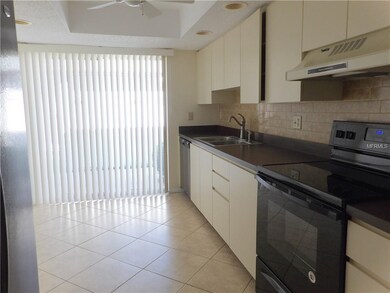 Sliding door to BBQ area. New stove.