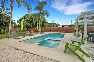 View of pool with a patio, a pergola, and an in gr