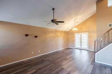 Double french doors lead outside to your private b