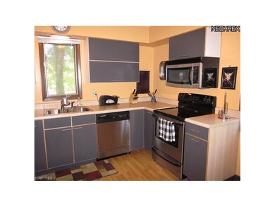 The updated kitchen features Ikea cabinets with pl