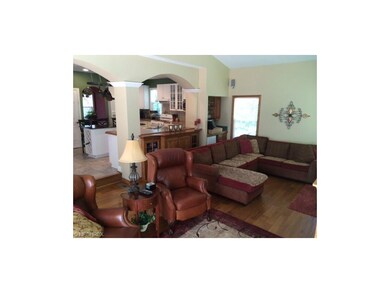 The great room has a wet bar area near the kitchen