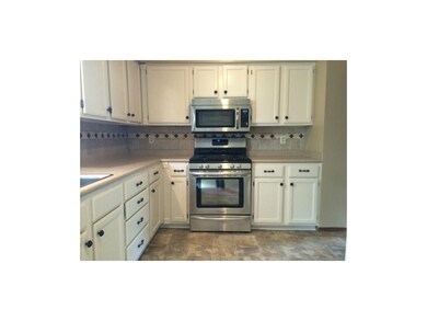 Updated kitchen with newly installed microwave and