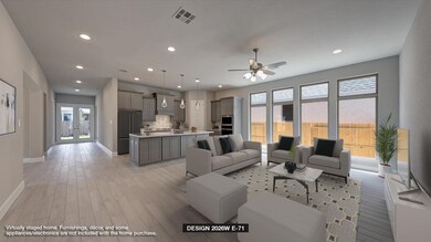 Living room featuring ceiling fan, plenty of natu