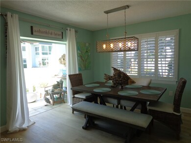 STEPS OUT ONTO THE FLORIDA ROOM WHERE YOU CAN RELA