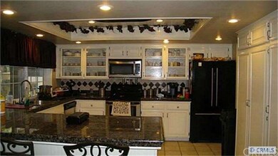 Nice kitchen with granite counters and great light
