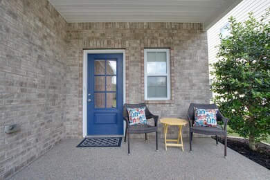 Nice covered porch area looking onto the neighborhood.