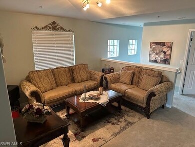 Living room featuring carpet flooring