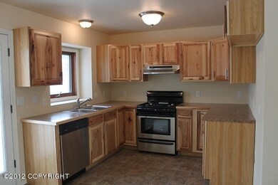 Remodeled kitchen with hickory cabinetry