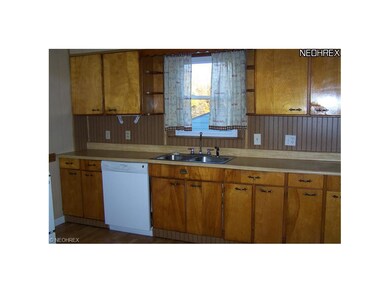 The spacious eat-in kitchen has lots of storage.