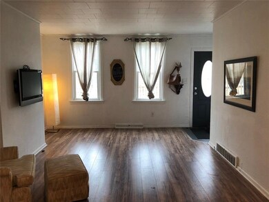 The living area gets lots of natural light, and ha