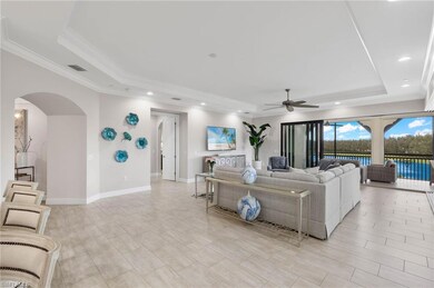 Great Room with a ceiling fan, crown molding, and 